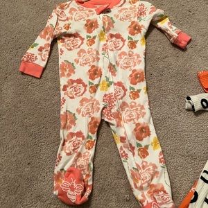 Burt’s Bees pink floral footed onesie
